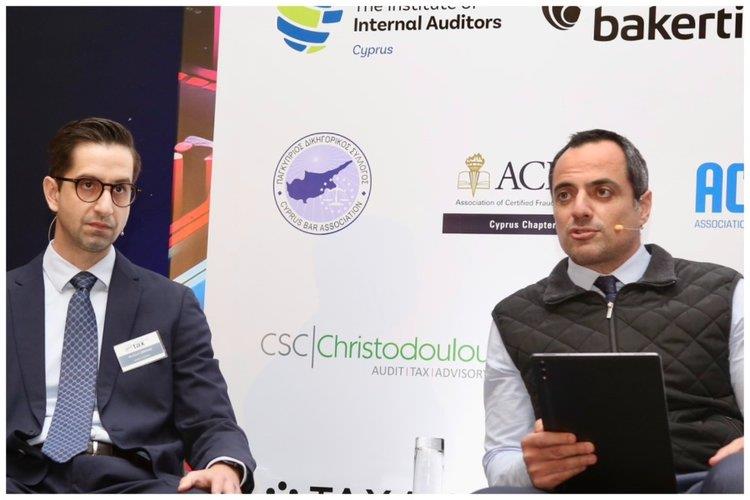 Michael C. Grekas of KPMG and George Liasis of EY